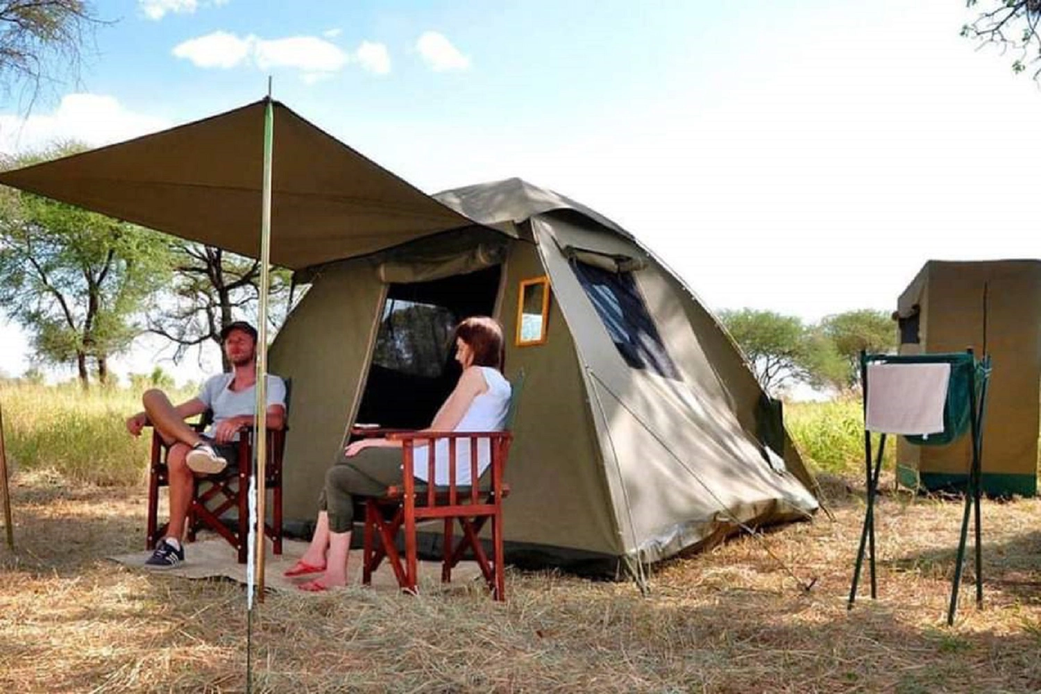 Couple camping during the 4-day Tanzania Budget Safari Tour Package